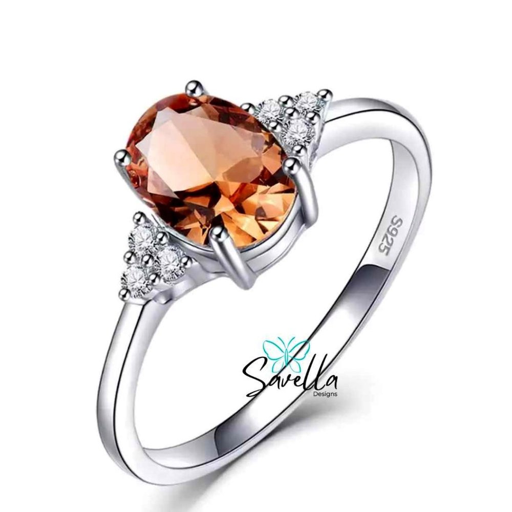 Zultanite Ring set in Solid Sterling Silver with Lab Created Accent Diamonds.